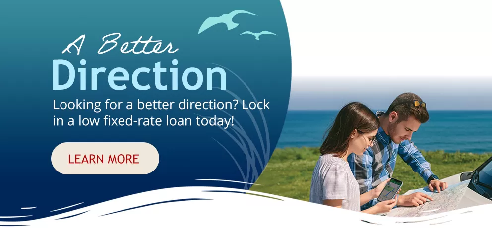 A father and daughter looking at maps standing outside of a white car overlooking water near a grassy ridge